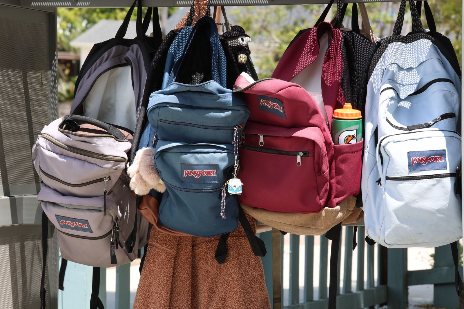 Travel backpacks and bags packed with personal belongings