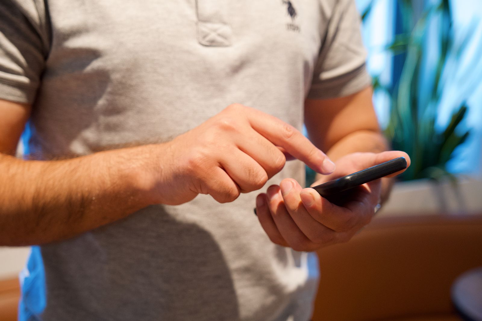 Traveller checking updates on a smartphone